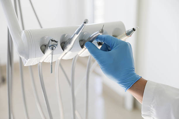 Professional Root Canal Treatment technician working in Cedar Rapids, IA